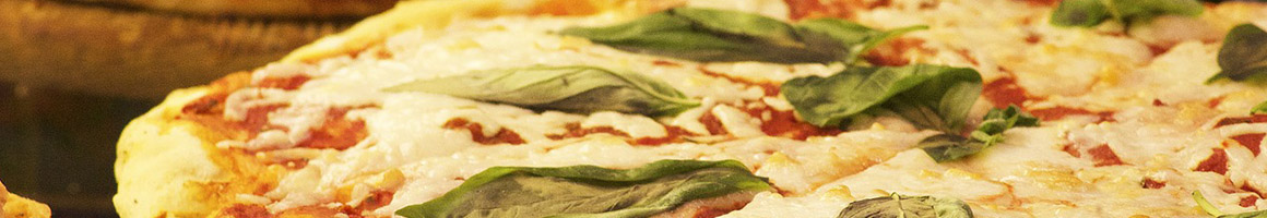 Eating Pizza at Sam's Wood Fired Pizza Co restaurant in Manchester, VT.